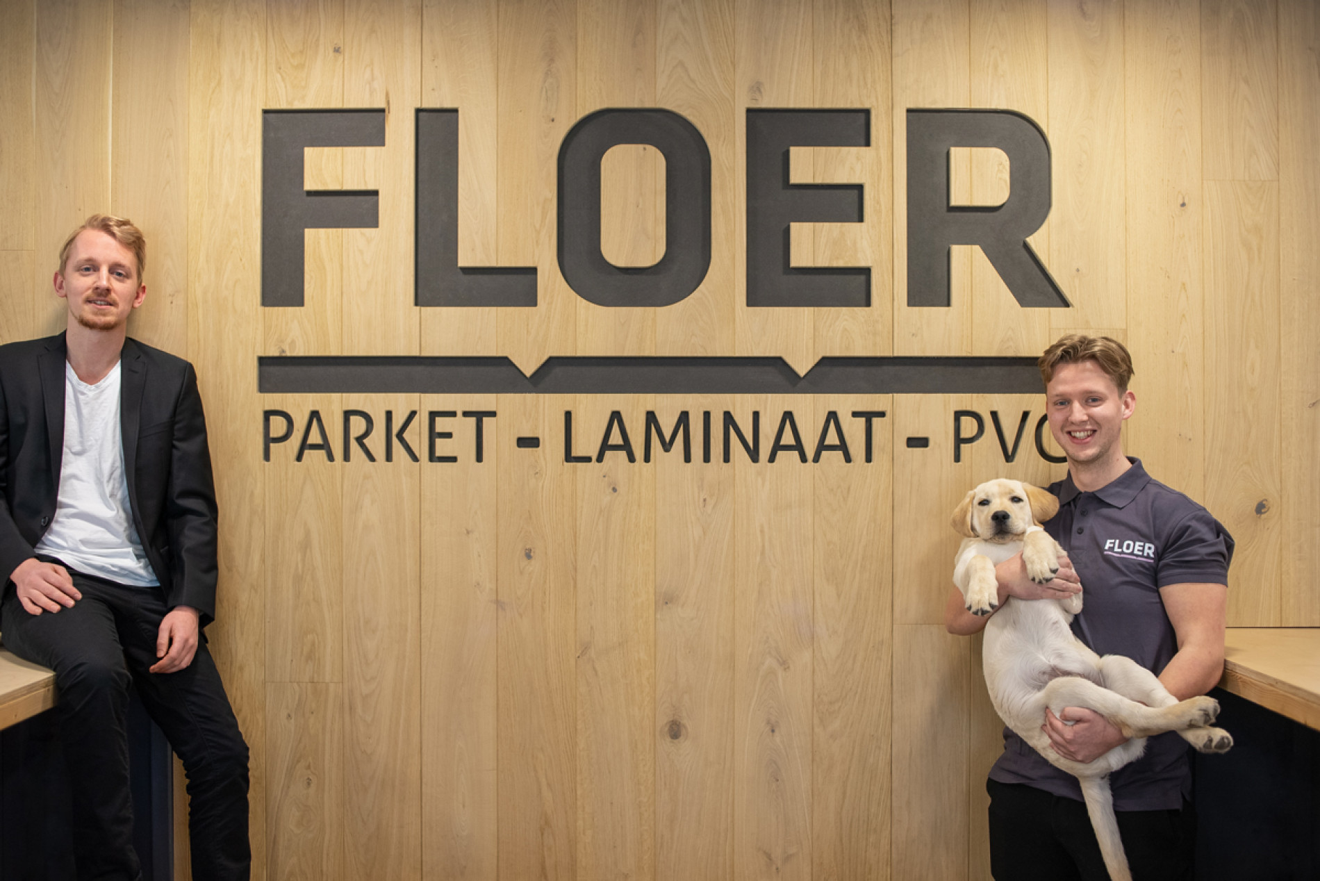 Foto: Floer broers Lennart en Matthijs Groenewold met hond Max